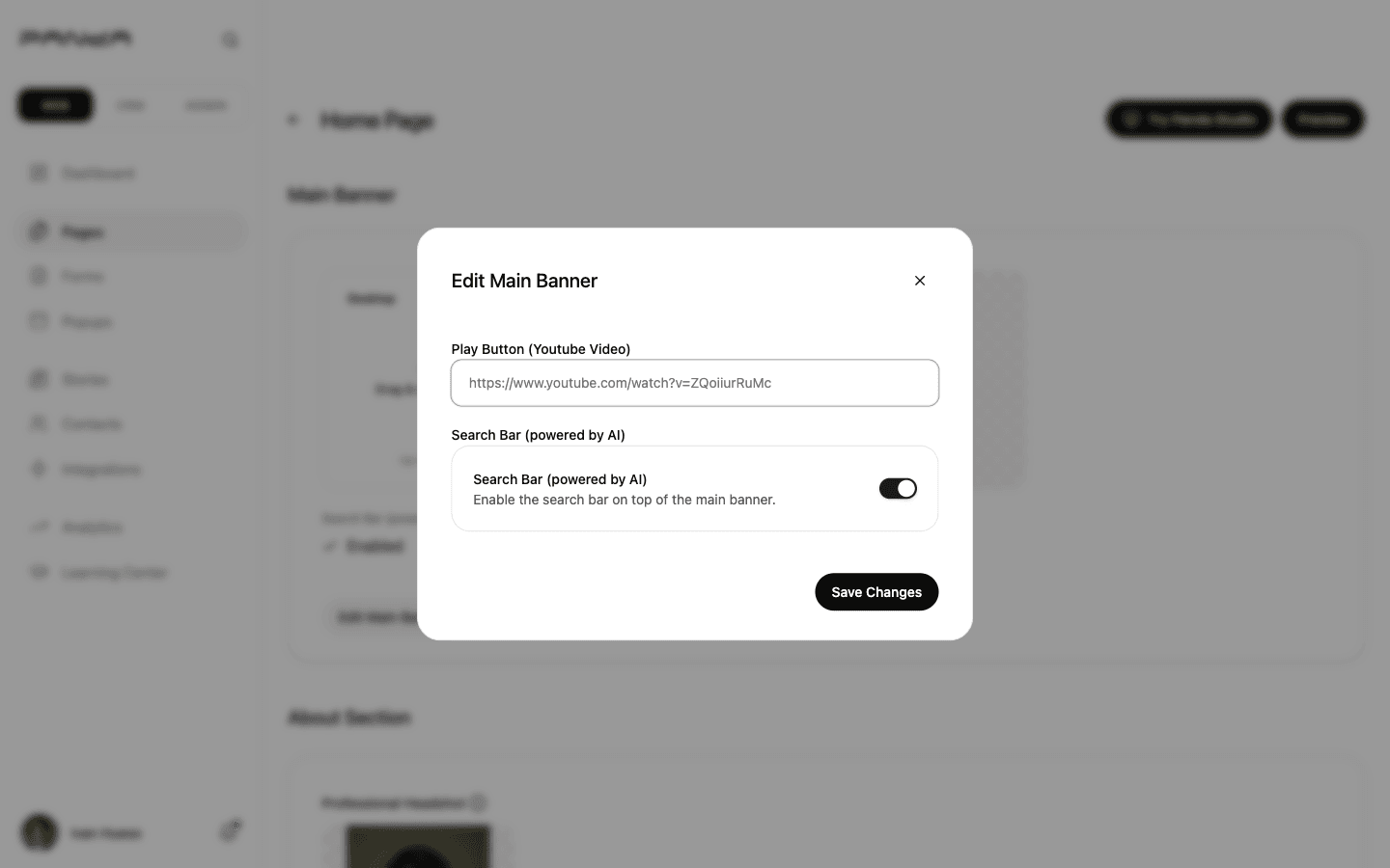 Edit Main Banner dialog showing Play Button YouTube video URL text field and Search Bar powered by AI toggle switch in the on position
